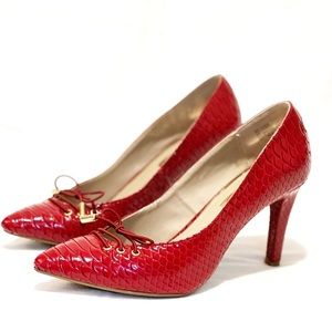NWOT Rialto red snake skin pointed toe stiletto lace up pumps
